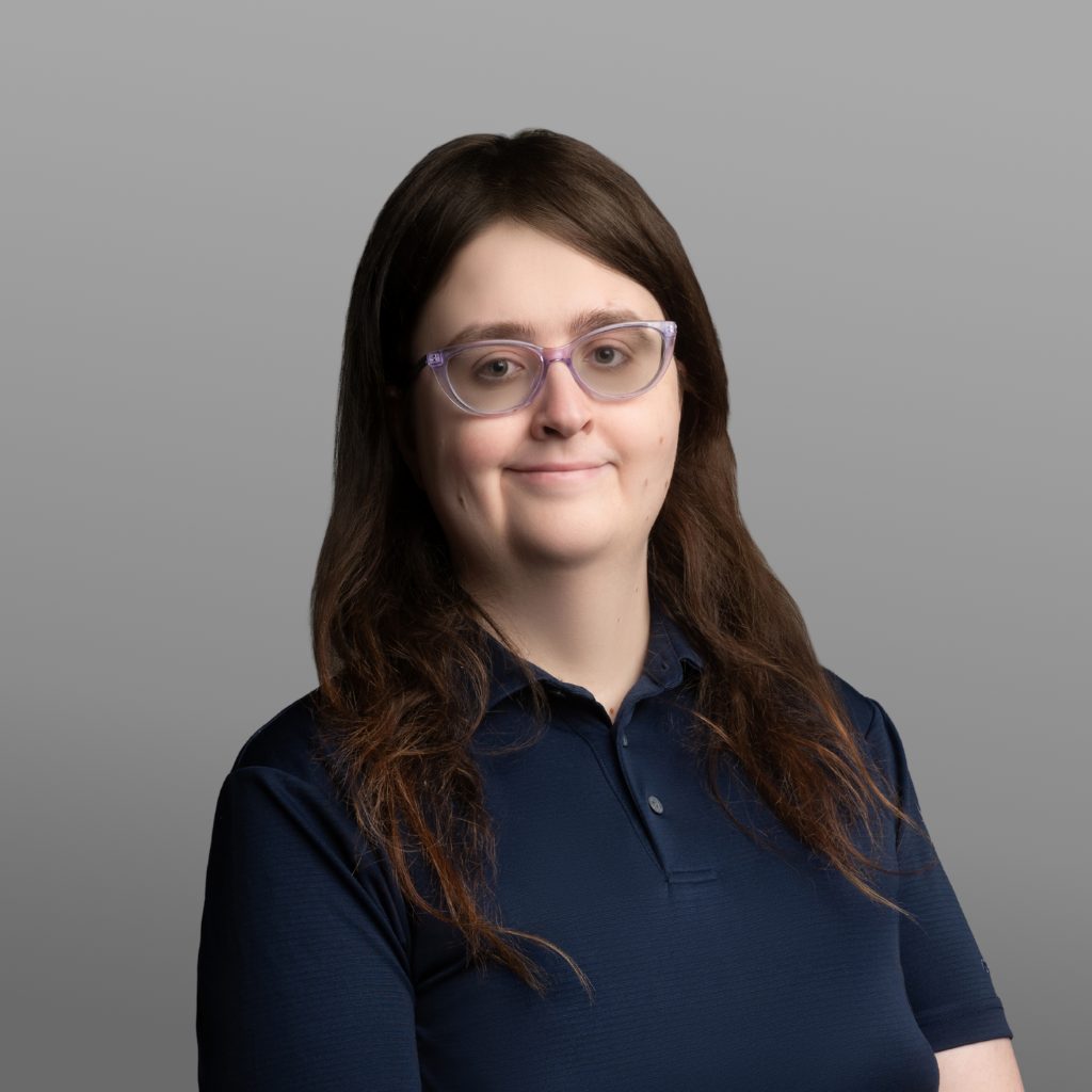 Faye Rabidoux - Headshot, Grey Background