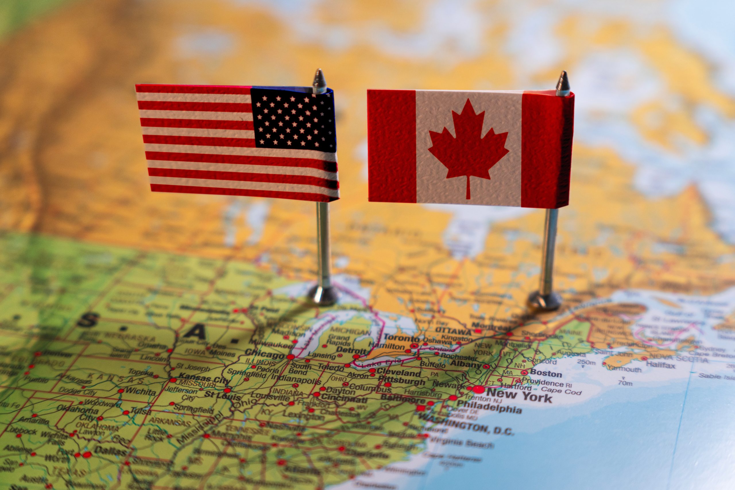IMAGE - United,States,And,Canada,Flags,Placed,On,A,Map,,Representing