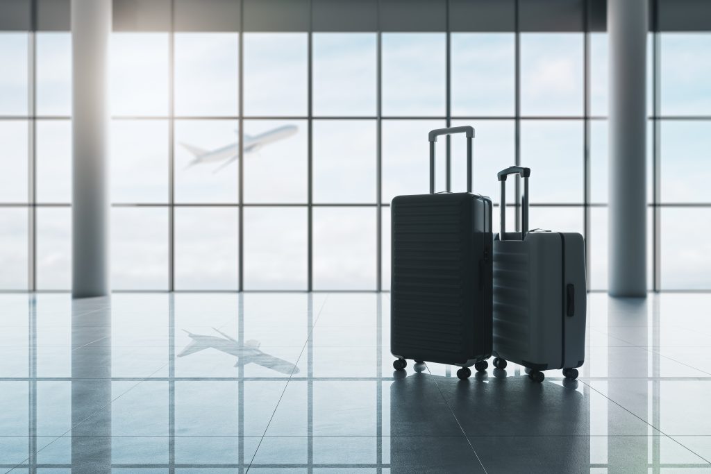 IMAGE - Travel,And,Vacation,Concept,With,Hand,Luggage,Suitcase,And,Big
