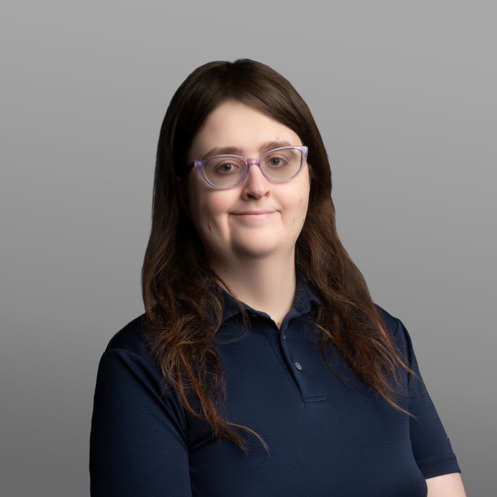 Faye Rabidoux - Headshot, Grey Background
